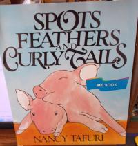 Spots, Feathers, and Curly Tails